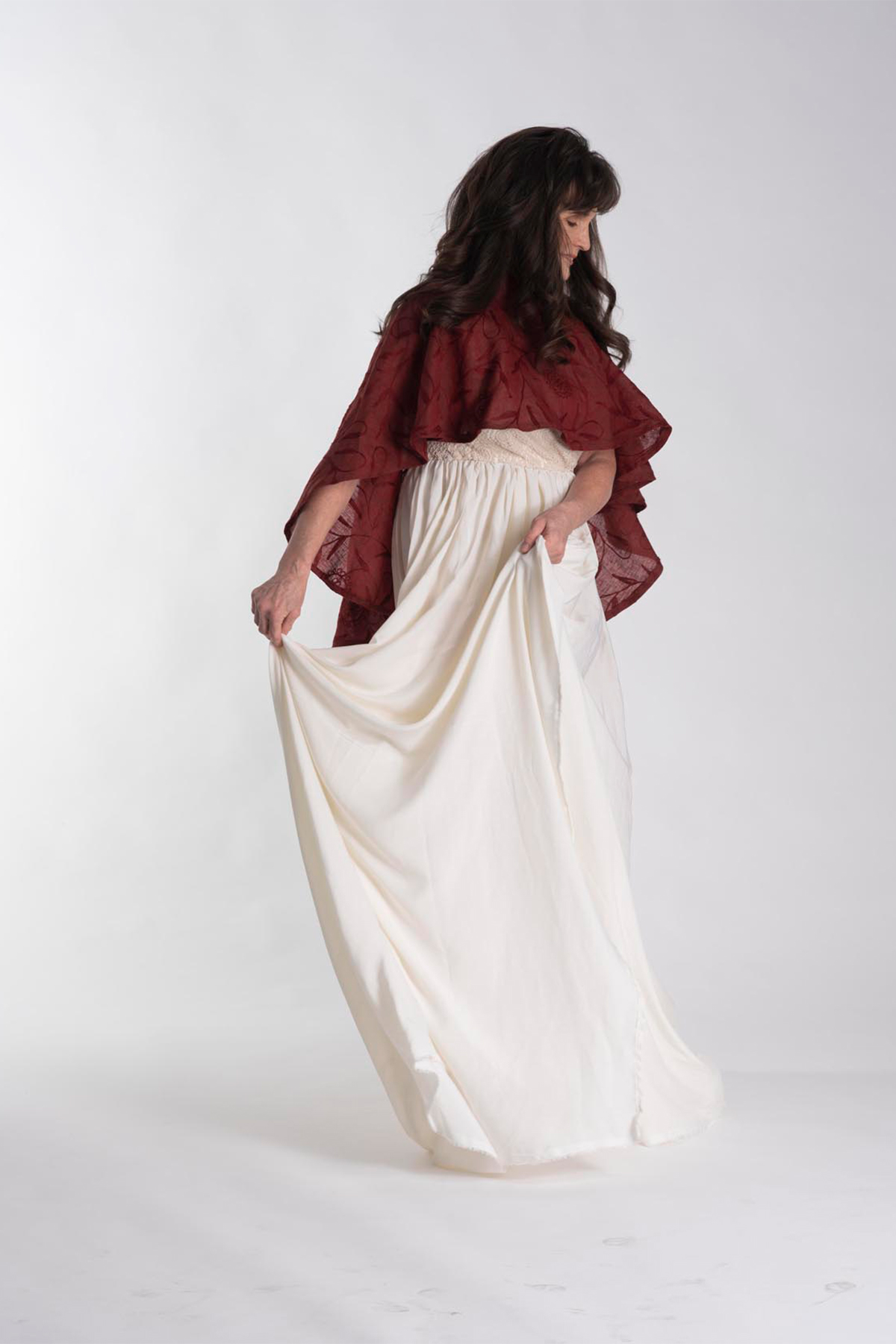 two-piece wrap dress with a linen capelet and rayon blend skirt with lace bodice